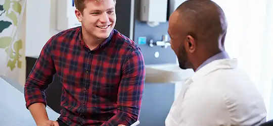 man talking with doctor