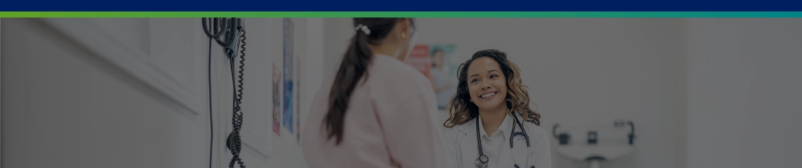 female doctor smiling at patient